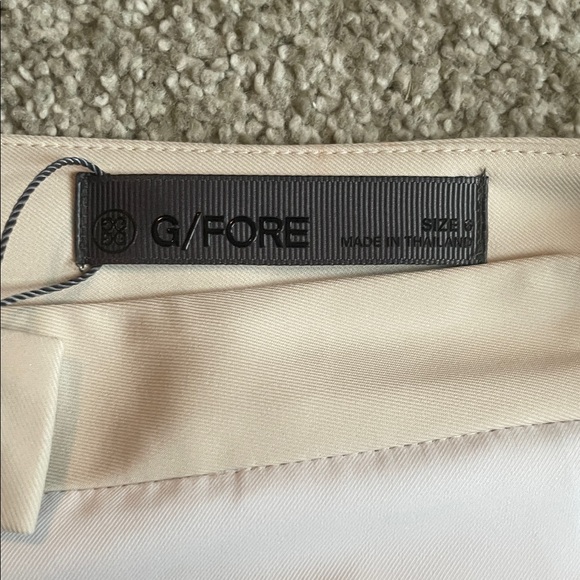 NWT G/FORE Women’s Side Stripe Stretch gold pant in white, blue and tan. Size 6 - Picture 2 of 7